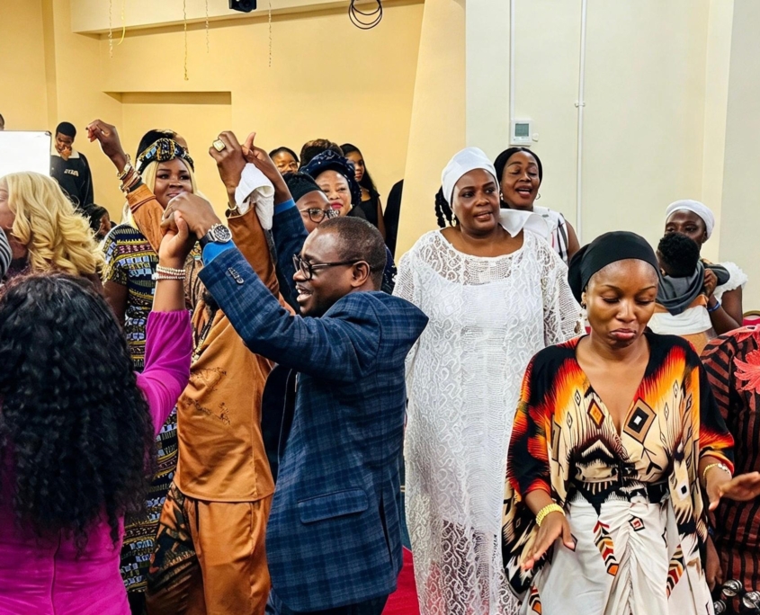 Church members joining together in fellowship and praise